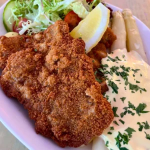 Golden Stage Schnitzel with Asparagus at Lieschen Mueller Berlin Alexanderplatz